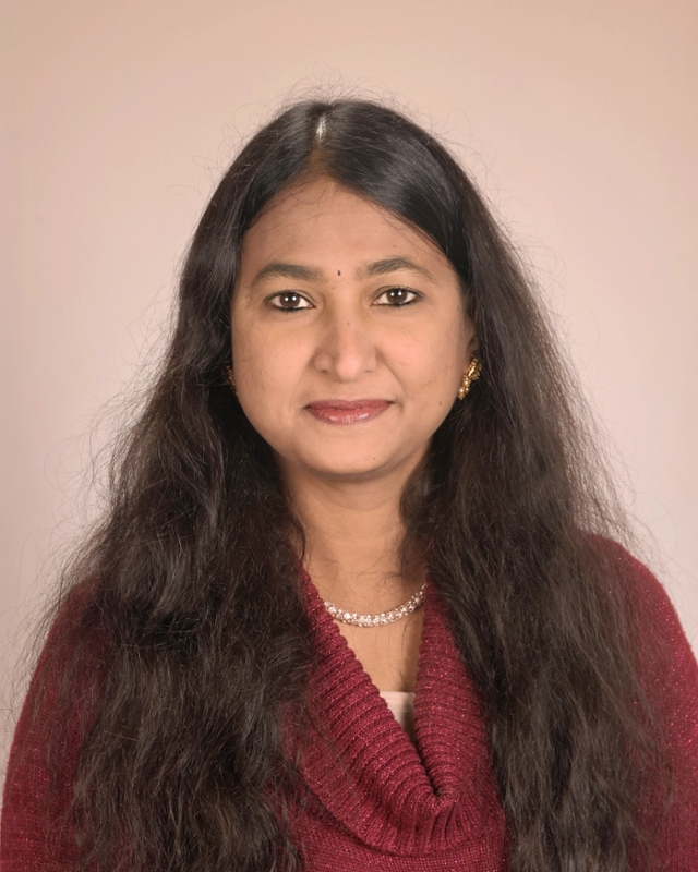 Ms. Anu, teacher at ABCD Academy for Children